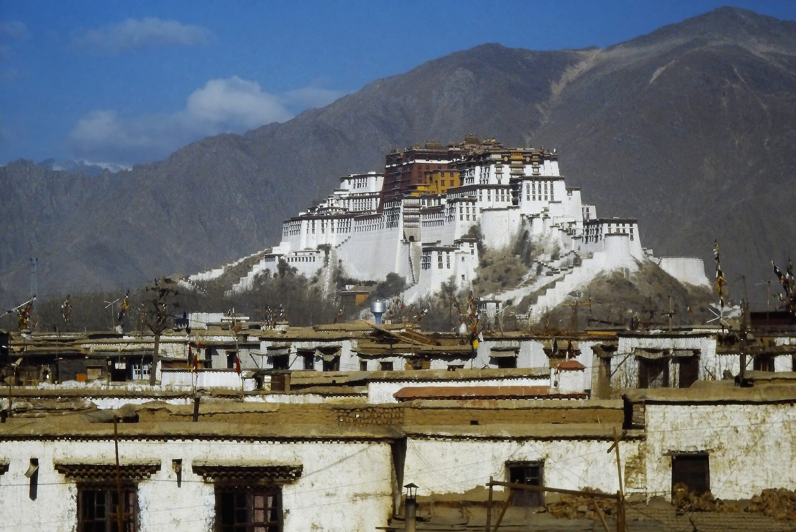 The Potala Palace above the rooftops of Lhasa, Tibet